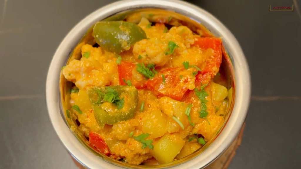 vegetable korma in a serving bowl